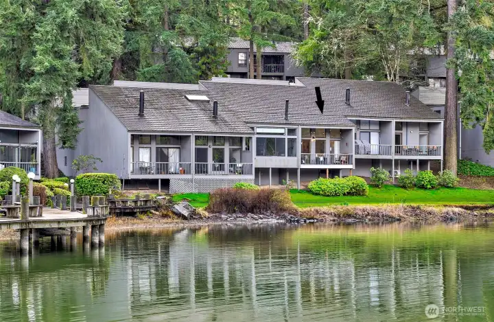 Stunning remodeled lakefront townhome offering modern style and serene waterfront living.