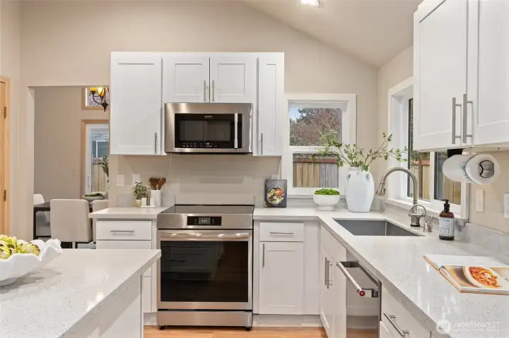 The induction range provides fast, energy-efficient cooking with precise temperature control and easy cleanup.