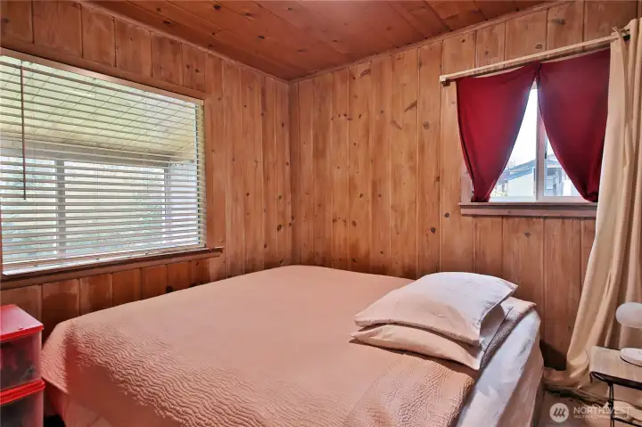 The front bedroom looks out over the front yard.