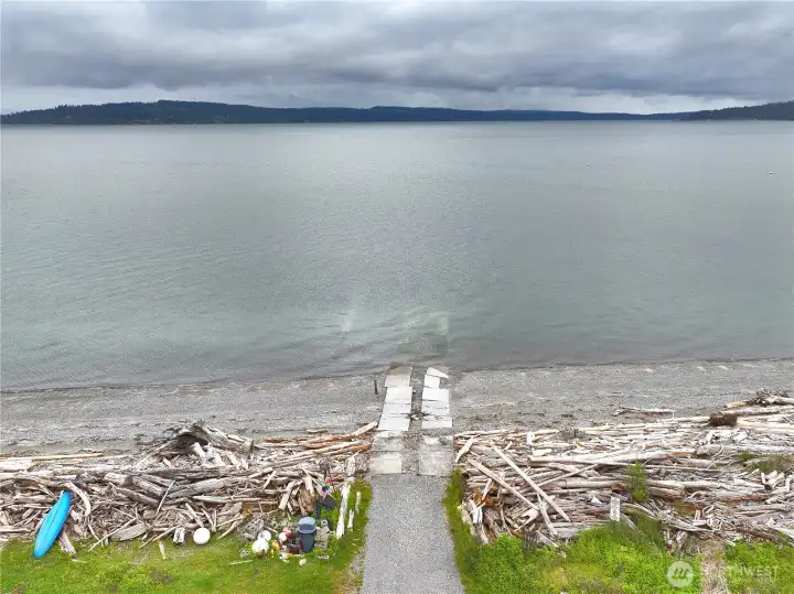 Just across the street - launch a boat directly into the sound at the top of Holmes Harbor!