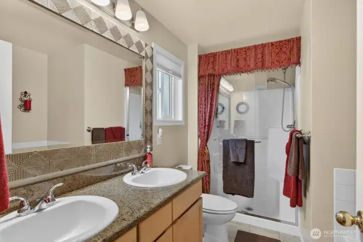 En-suite bath with shower and jetted tub En-suite bath with shower and jetted tub