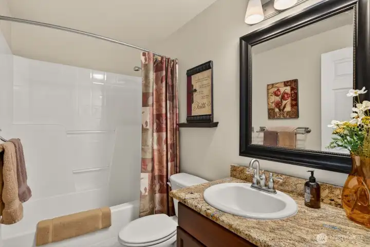 Guest bath with upgraded granite counter Guest bath with upgraded granite counter