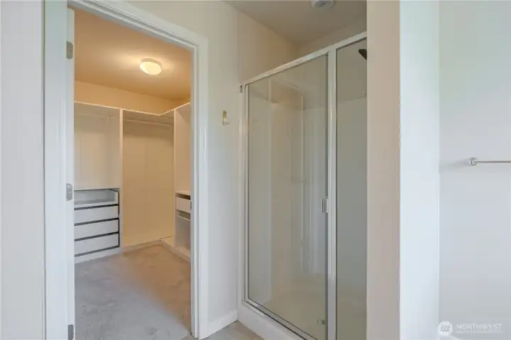 Owner's Walk-in Shower and Closet Owner's Walk-in Shower and Closet