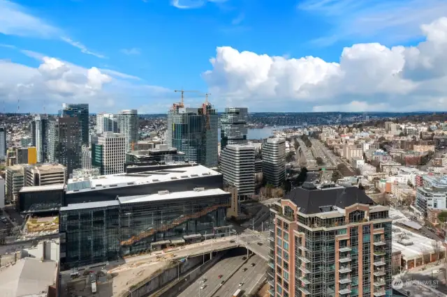 Drone view is looking out towards I-5, the convention center, and Lake Union