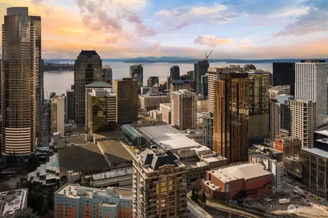 Drone view - Twilight of the city skyline looking onto Elliott Bay and the Sound