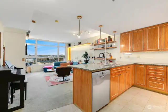 Entry leads into kitchen, living room.