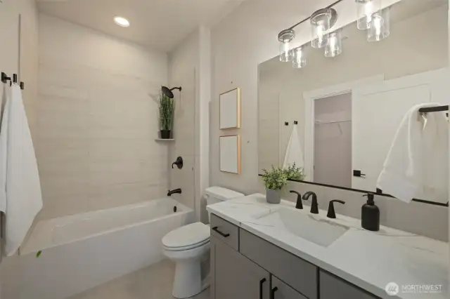 Guest Bathroom with on-suite - *Former Sinclair floor plan. Garage left. Finishes may vary.