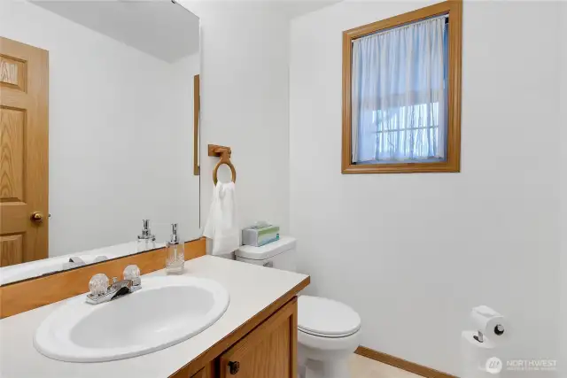 1/2 bath downstairs next to the laundry room off of the kitchen.