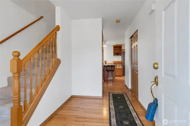 Entry of the home and straight through to the kitchen and dinette area all has REAL hardwood floors. There is a closet on each end of the hall one used as a second pantry and the one on the left for guests and storage. The stairs up lead to 3 spacious bedrooms and an office. A main hall bath and a large primary bath