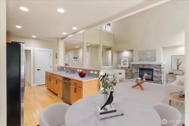 Virtually staged breakfast nook and living area.