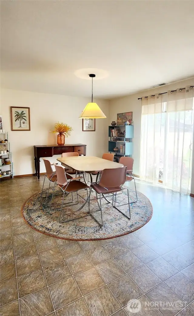 Dining Room with sliding glass door that goes to the back yard.