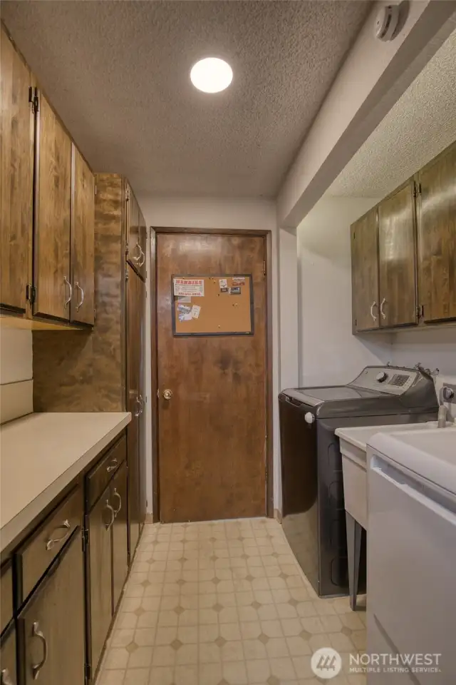 Utility room between kitchen and garage.