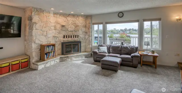 Main floor living room, with propane fireplace.