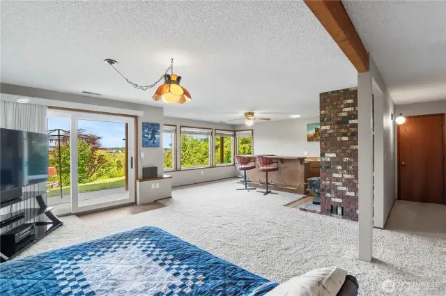 Basement area with wet bar.