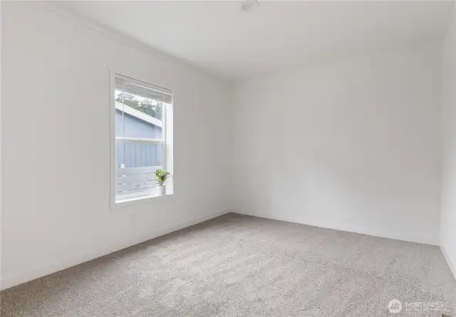 Bedroom #3.  Roomy with nice vaulted ceiling