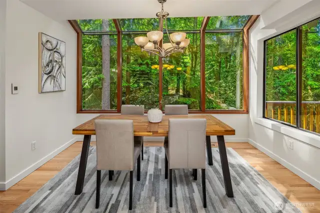 Walls of windows allow for an abundance of natural light.