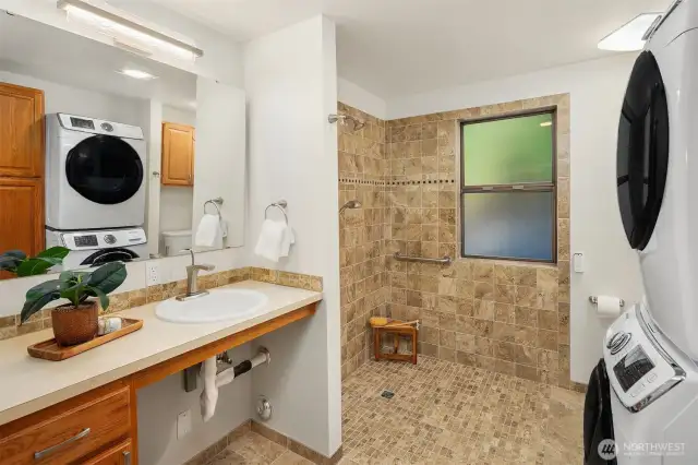 Main floor bathroom has ADA shower - perfect for a dog washing station.