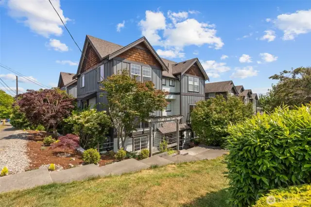 South-facing home is framed with easy maintenance landscaping.