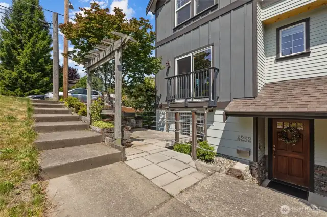 Enjoy outdoor time on the patio in front of the home.