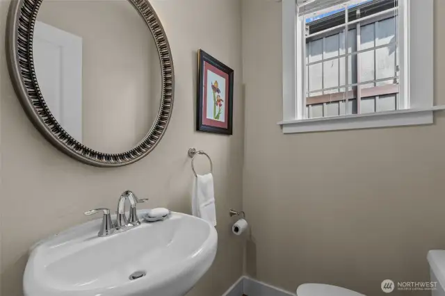 Convenient 1/2 bath next to the kitchen.