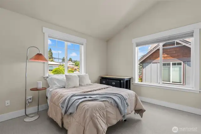 First of 2 bedroom suites has soaring vaulted ceilings and plenty of daylight.