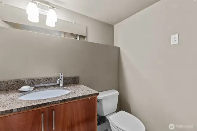 Convenient 1/2 bath within garage.
