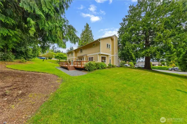 Parklike backyard for outdoor enjoyment and entertainment.