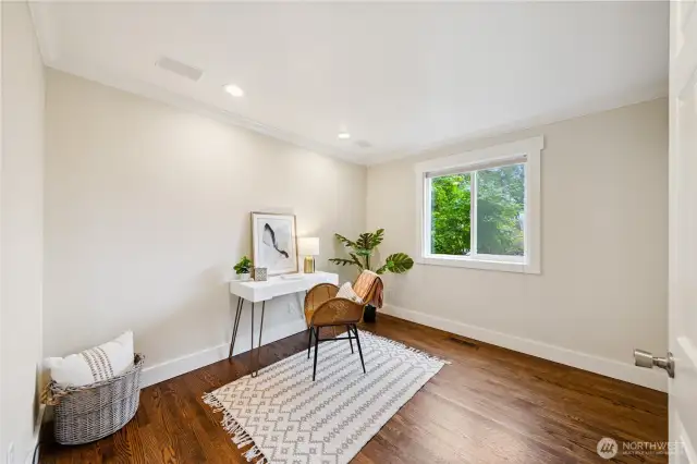 Main level bedroom with closet could also be utilized as an office.