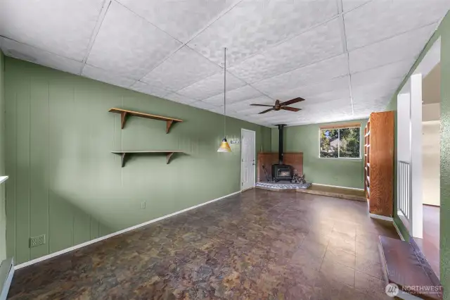 Original garage converted into living space bring additional square footage to this home provides access to 1 car garage
