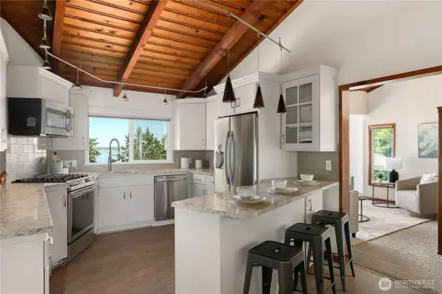 Updated kitchen with entrance to den/family rm at right