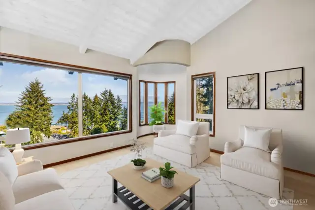 Virtual renovation shows how the den/family room would look if the ceilings were whitewashed.