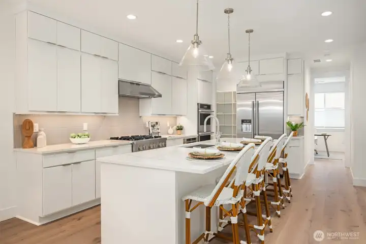 Floor to ceiling windows draw natural sunlight throughout the home Floor to ceiling windows draw natural sunlight throughout the home