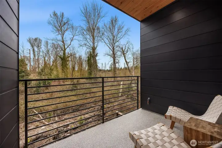 Covered deck with open view of 17acres of protected greenbelt Covered deck with open view of 17acres of protected greenbelt