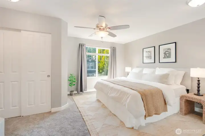 Generous primary with two closets + linen closet.