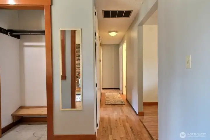 A practical and neatly tucked-away space for coats, shoes, and everyday essentials, adding extra storage without compromising on style.