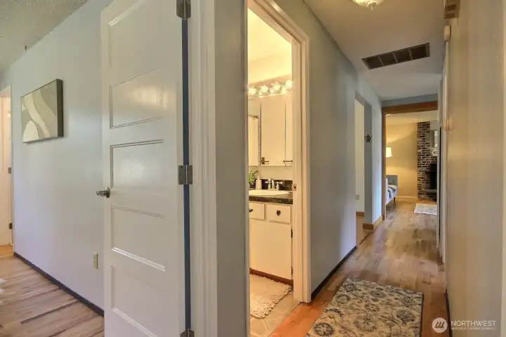 The well-designed hallway creates a smooth flow between key areas of the home, enhancing accessibility and ease of movement.