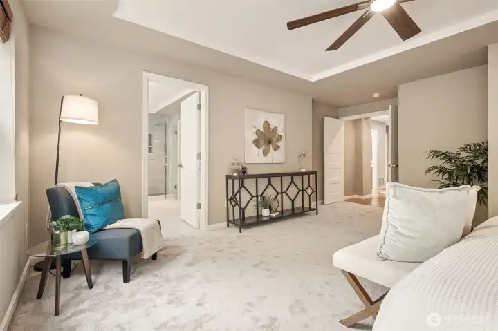 Another view of the primary bedroom.