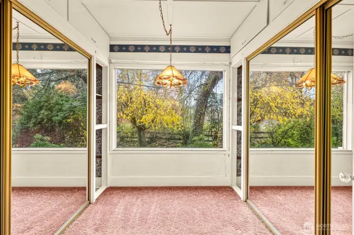 Bedroom 2 on main level that could also be a coffee or reading nook.