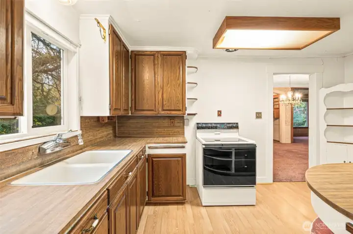 Kitchen has character! See renovation boards at house for ideas for a fresh look.