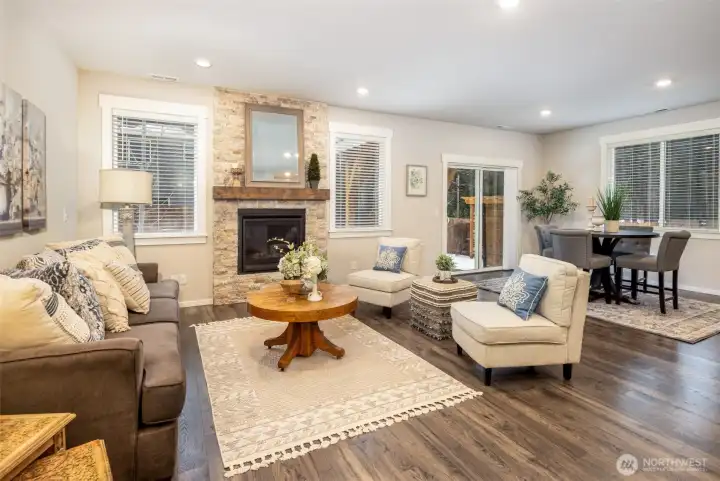 Open space great room with ample natural lighting.