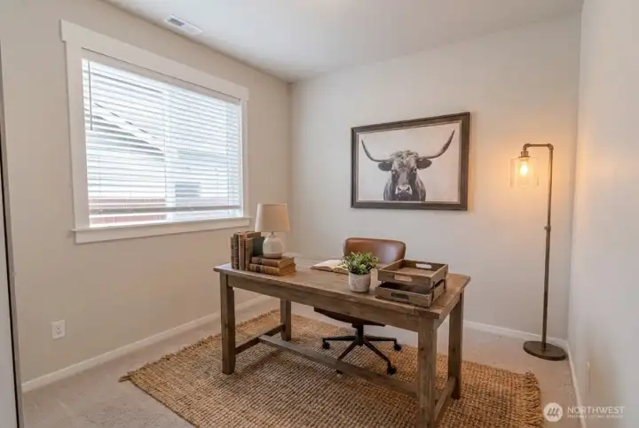 bedroom 2 virtually staged as an office.