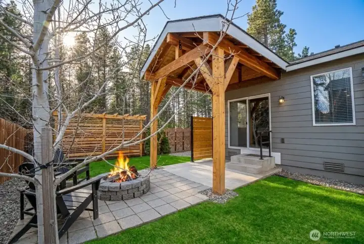 Beautifully handcrafted covered patio showcasing rich cedar inlay work.