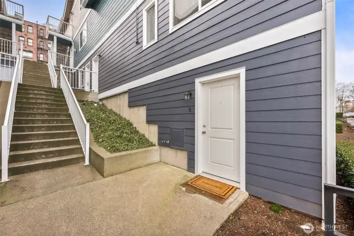 Welcome home! Stairs lead to dedicated parking stall.