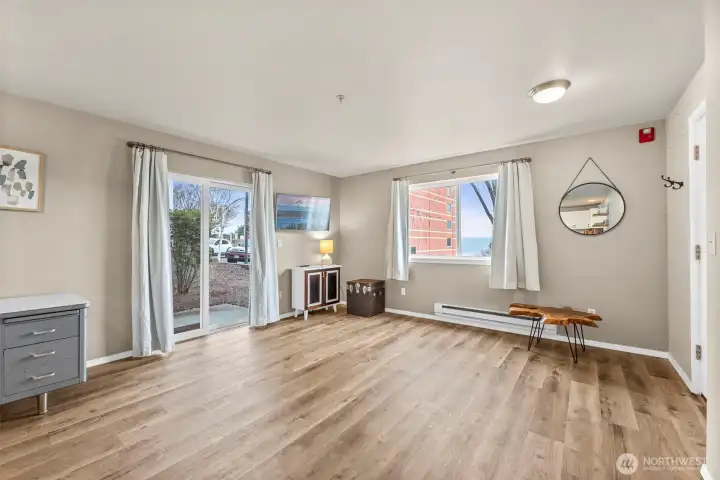 View from kitchen into living space. View from kitchen into living space.
