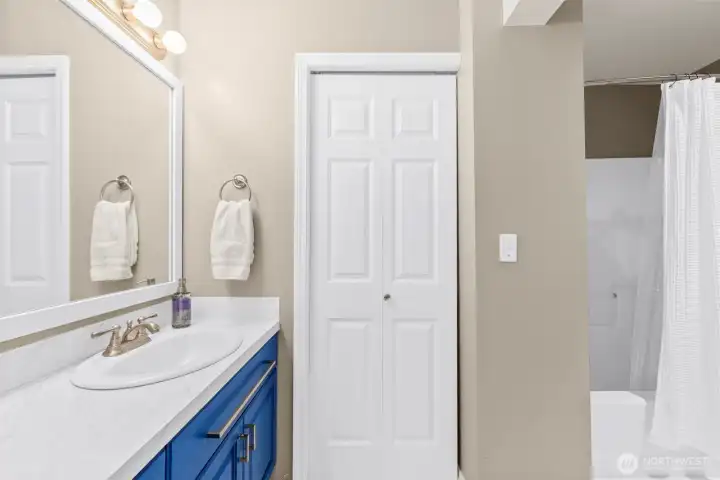 Jack and Jill style full bath with access to primary bedroom.