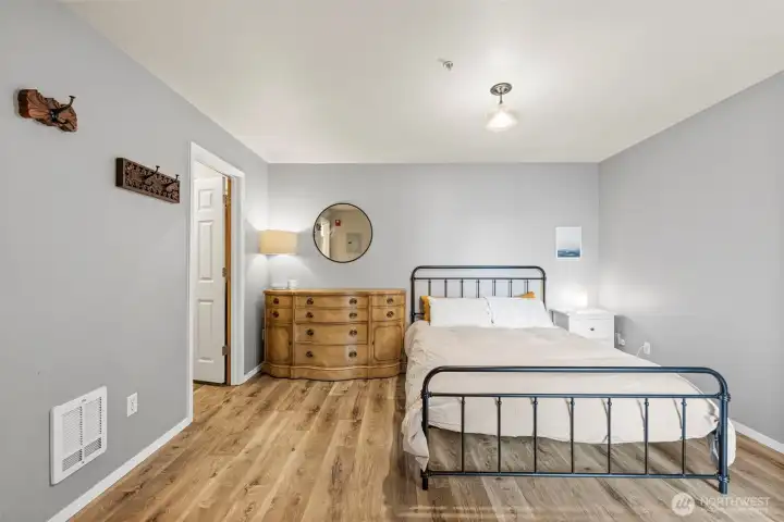 Spacious primary bedroom and walk in closet.