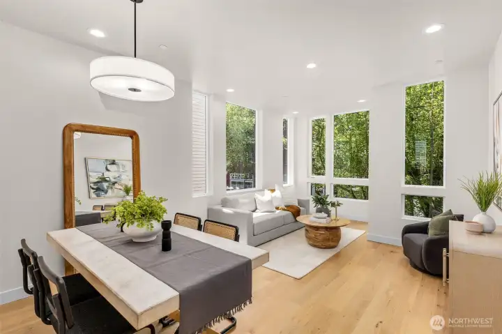 The main living level features thoughtful architectural details and is flooded with abundant natural light