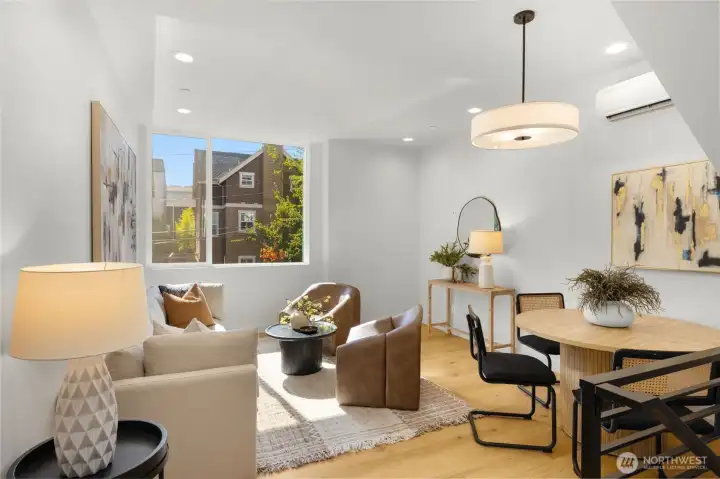 The heart of the home features a gourmet kitchen with a large eat-in island and high-end stainless steel appliances