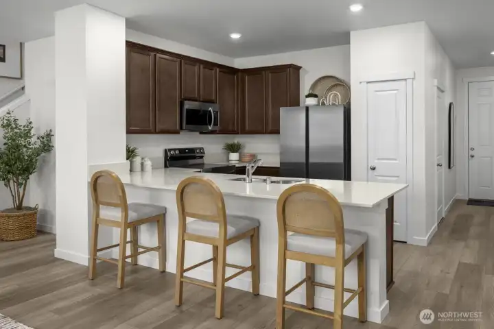 Kitchen of model home. Finishes and details may vary.