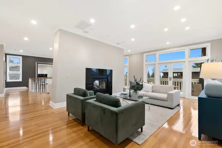 On the other side of the fireplace, there is the perfect hang out space - plus another entrance to the deck!